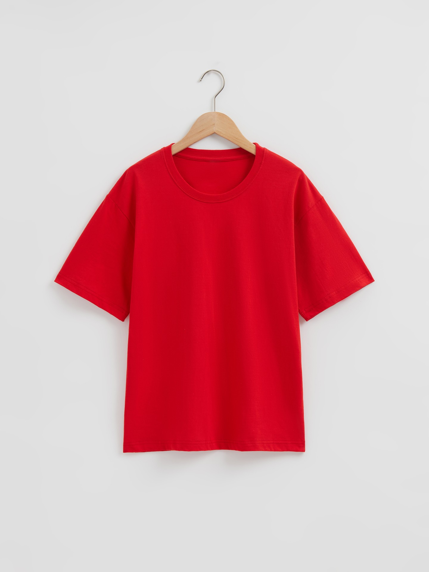 Preços baixos em Camiseta sólido Uniqlo Blusas para mulheres